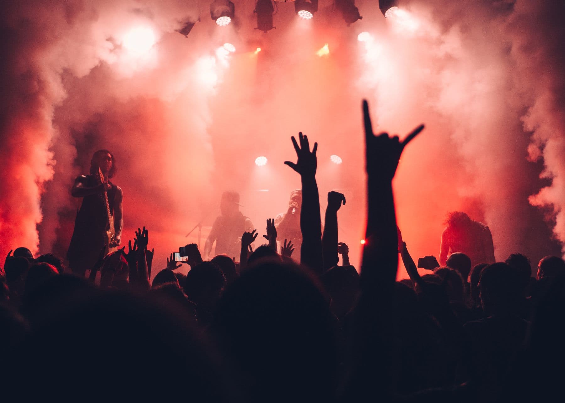 Crowd at a live gig with stage lights