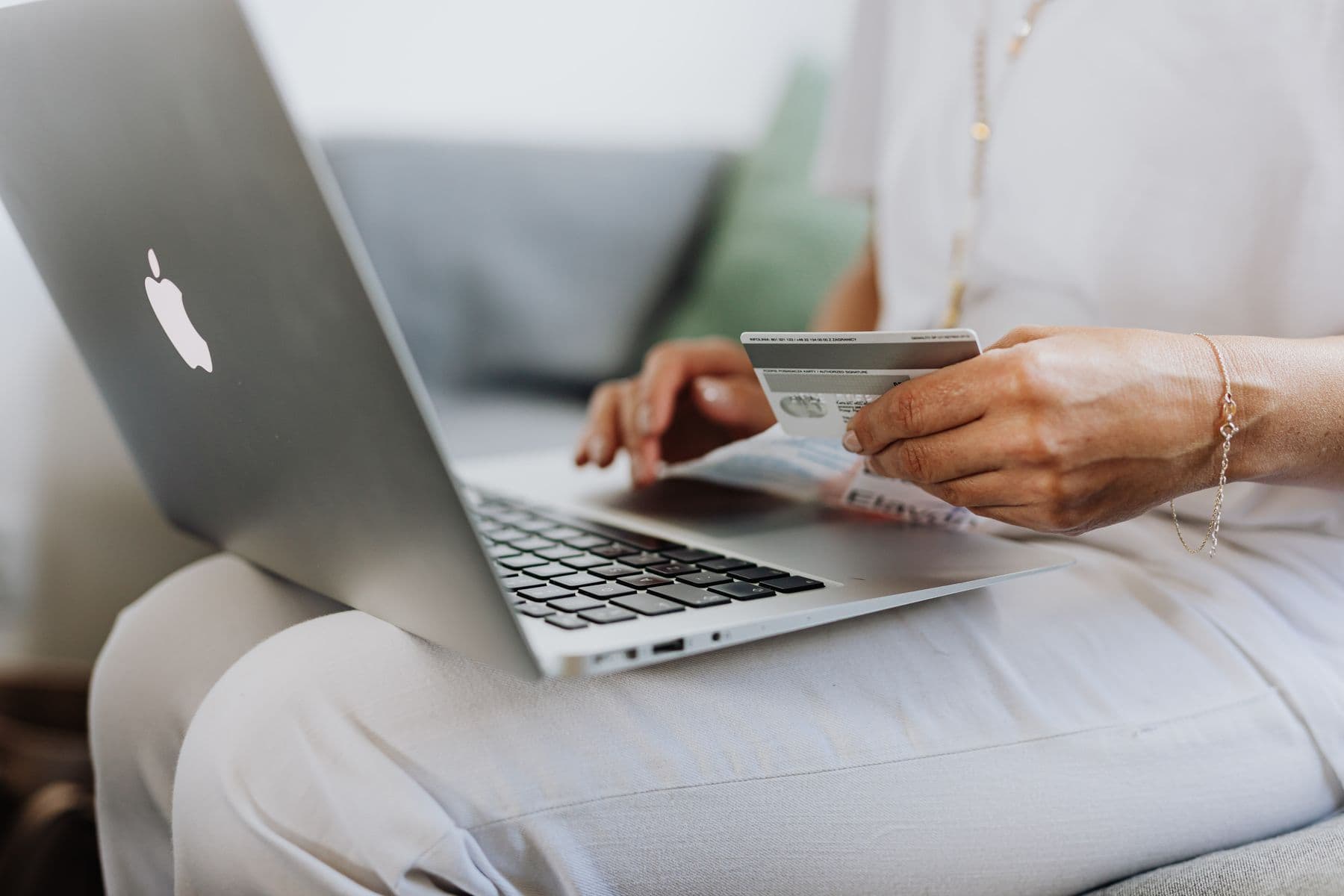 Person reviewing a payment on a laptop
